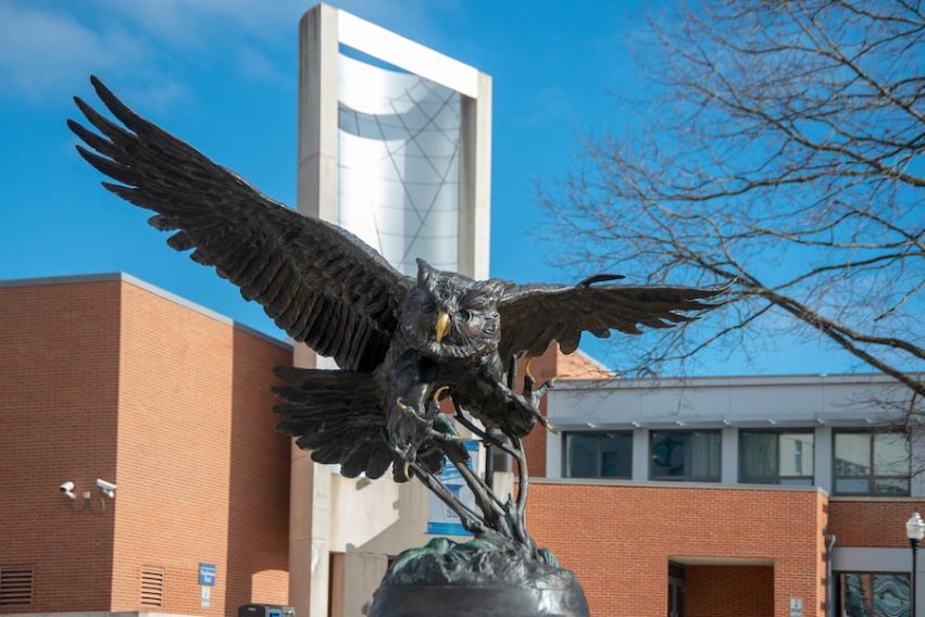 Sculpture of an owl in front of Engleman Halll, the main academic building on the SCSU campus