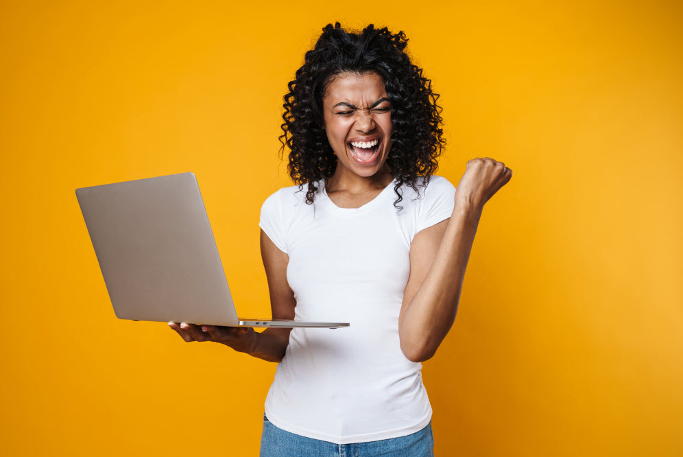 Image of female college student with laptop