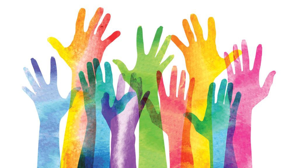 Raised hands in several colors overlapping each other