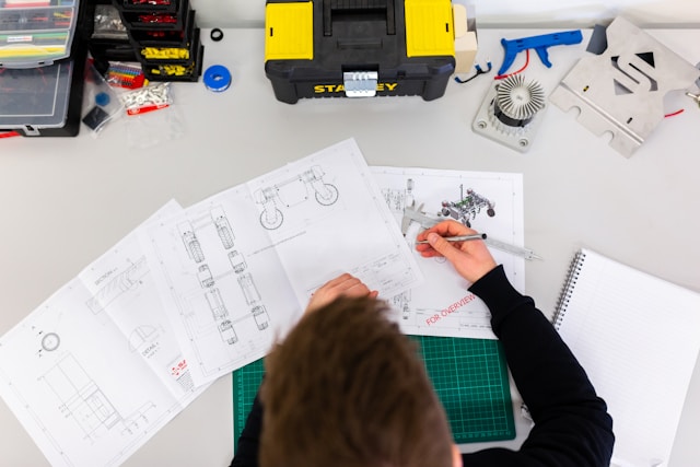person studying engineering, photo by ThisisEngineering on Unsplash